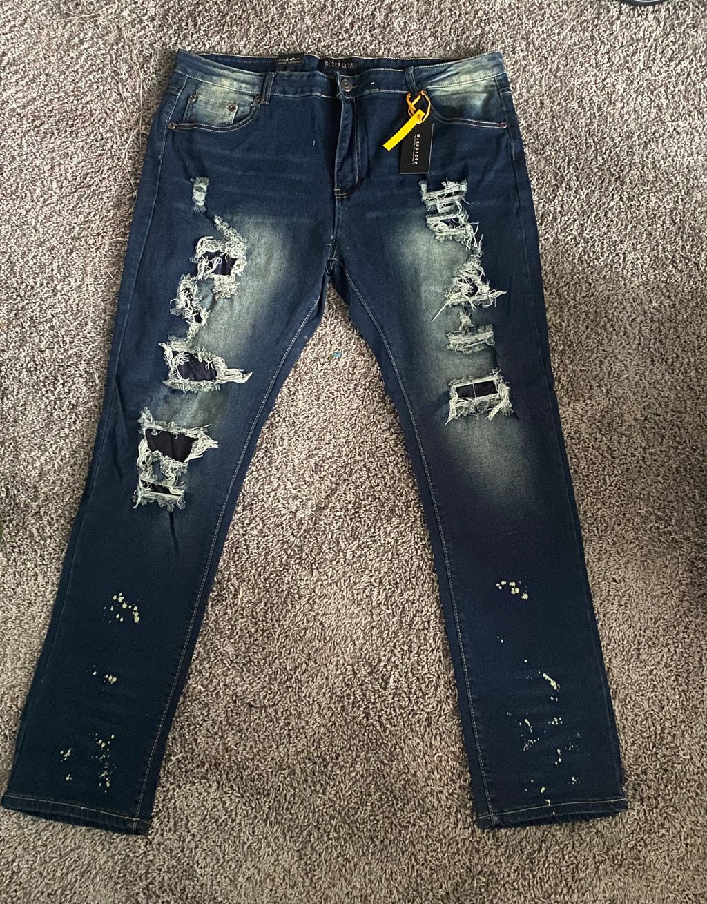 Ripped Dark Blue Jeans